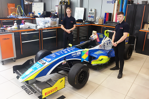 Alpha Apprentices with Formula Renault race Car